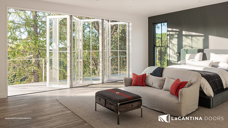 Professionally installed LaCantina doors creating open living spaces with refined architectural style