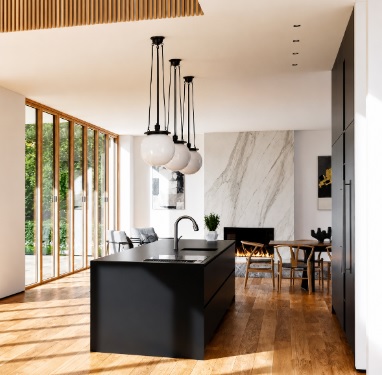 Modern kitchen with large glass bi fold doors letting in natural light and opening to outdoor space in Laguna Niguel, CA.