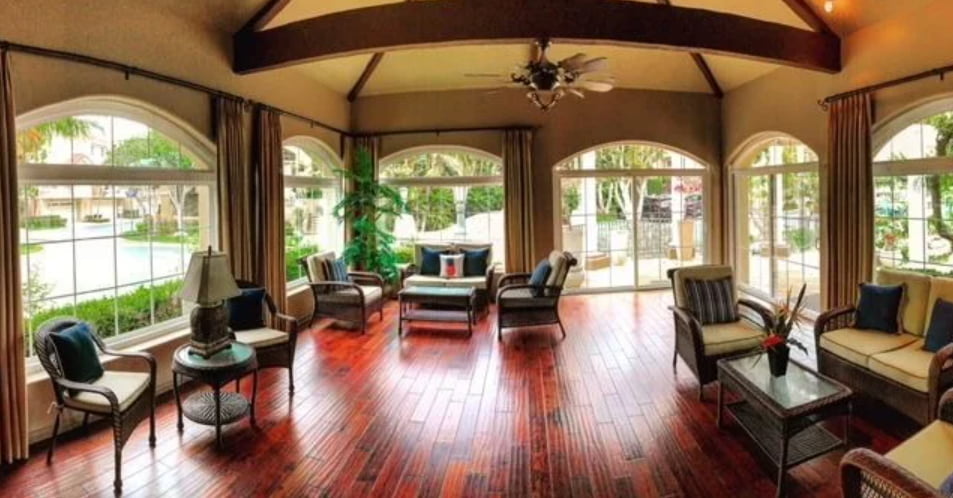 Spacious home interior with arched Costa Mesa, CA replacement windows enhancing natural light